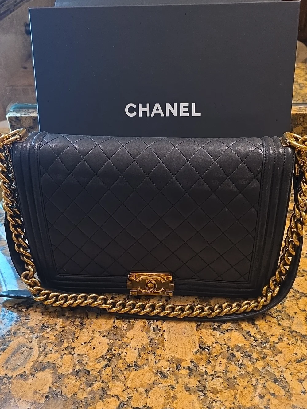 CHANEL Medium Boy Bag Quilted Lambskin Crossbody with Gold Hardware.